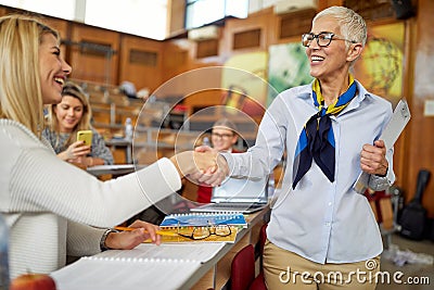 Female professor congratulate female student on the score Stock Photo