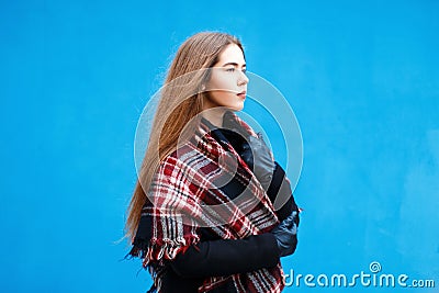 Female profile. Beautiful young girl with a scarf and coat Stock Photo