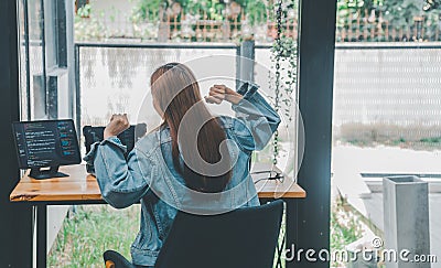 Female programmers are stretching oneself and relaxing after working and planning to work on programming, software coding and web Stock Photo