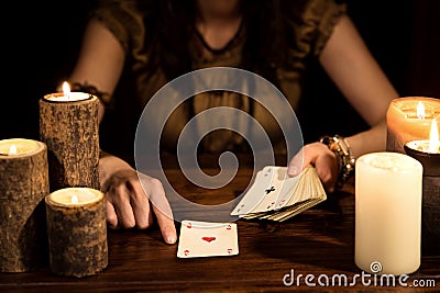 Female psychic is telling the future with cards, concept tarot a Stock Photo