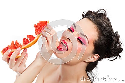 Female with pummelo slice Stock Photo