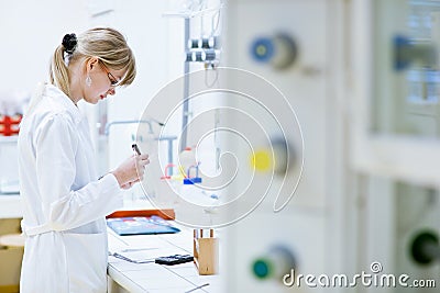 Female researcher in a chemistry lab Stock Photo