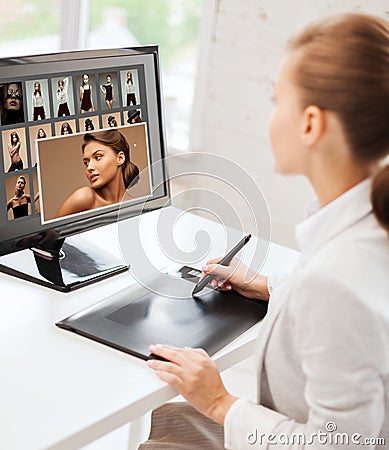 Female retoucher working at home or office Stock Photo