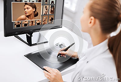 Female retoucher working at home or office Stock Photo