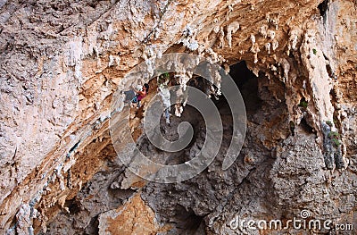 Female rock climber on a cliff face Stock Photo