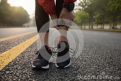 runner touching sport injured calf Stock Photo