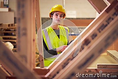 Female Safety Inspector With Digital Tablet At Construction Site Stock Photo