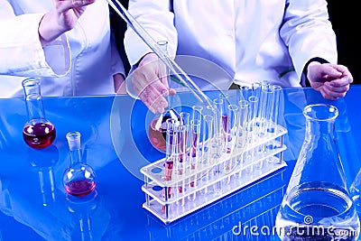 Female Scientists experimenting Stock Photo