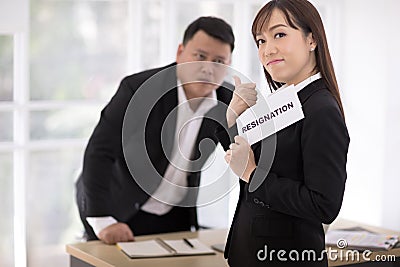 female secretary Came to submit a resignation letter to her supervisor Stock Photo