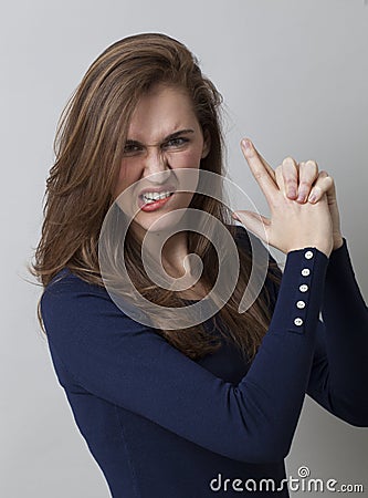 Female self-defense concept for angry James Bond Girl Stock Photo