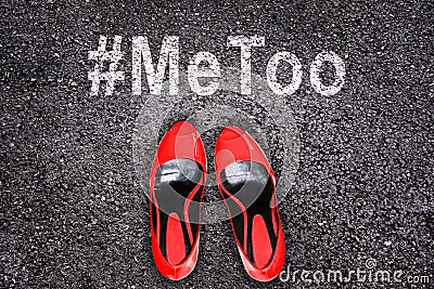 Female shoes on asphalt, hashtag MeToo Stock Photo