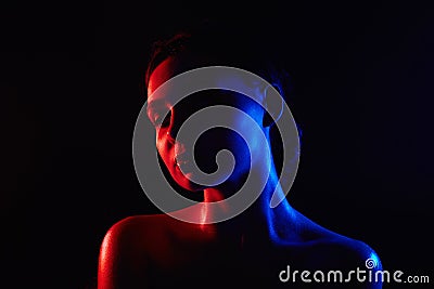 Female silhouette, beautiful Girl in color lights Stock Photo