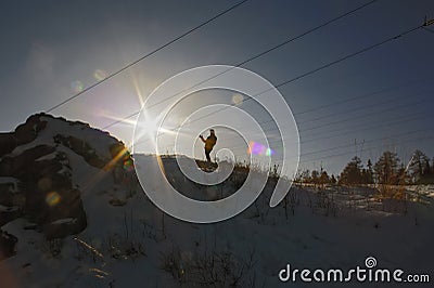 Female silhouette at the top of the mountain Stock Photo