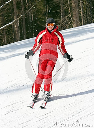 Female skier on a slope Stock Photo