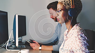 Female software developer working for IT company Stock Photo