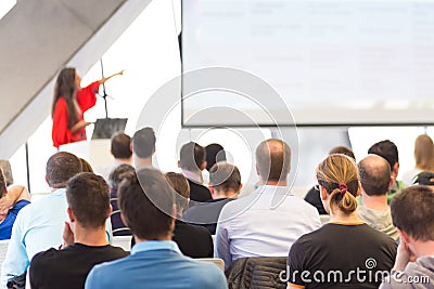 Female speeker having talk at public event. Editorial Stock Photo