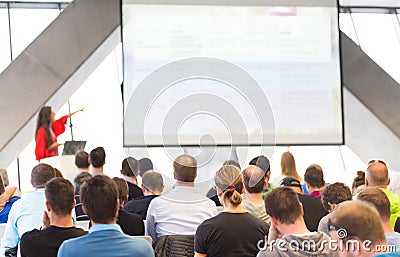 Female speeker having talk at public event. Editorial Stock Photo