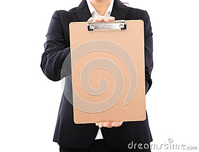 The female staff in front of the white background is wearing formal clothes, holding a blank file hard board clip Stock Photo