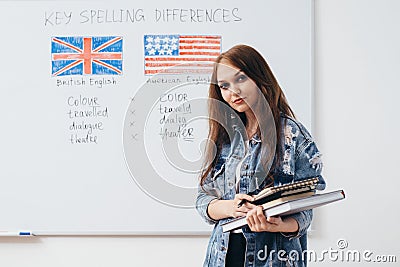Female student looking at camera. English language school. Stock Photo