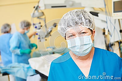 Female surgeon doctor in operation room Stock Photo