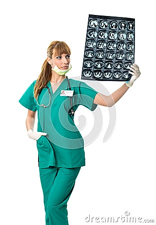 Female surgeon looking at x-ray image Stock Photo