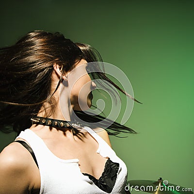 Female swinging hair. Stock Photo