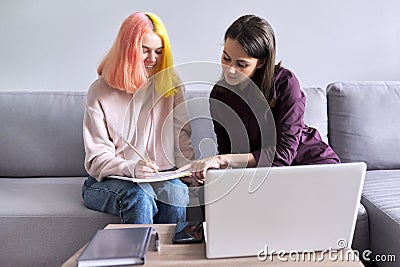 Female teacher teaches individually college student Stock Photo