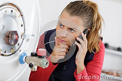 female technician on phone Stock Photo