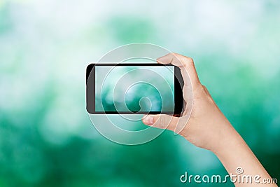 Female teen hand taking picture with smart phone Stock Photo