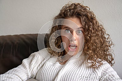 Female teenager looking in the camera having a funny face Stock Photo