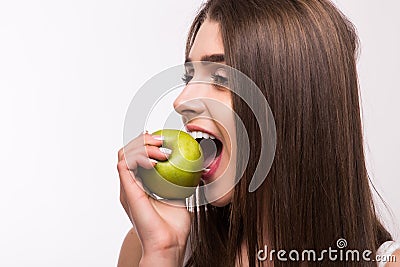 Female teeth and apple. Healthy eating on white background Stock Photo