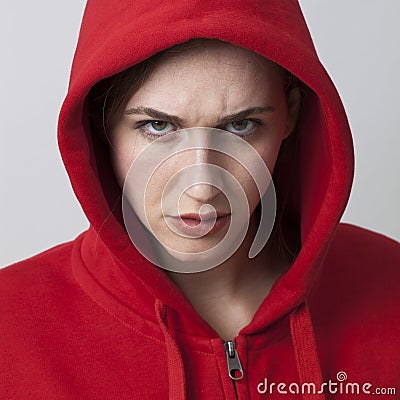 Female threat concept for angry 20s streetwear girl Stock Photo