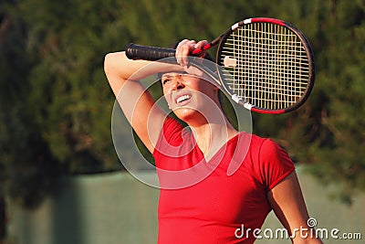 Female tired woman tennis player, racket. Wipes sweat Stock Photo