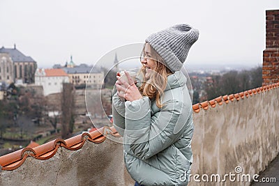 Female tourist against the background of town in the Czech Republic - Kutna Hora Stock Photo