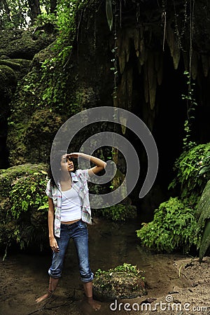 Female tourist lost in the jungle Stock Photo