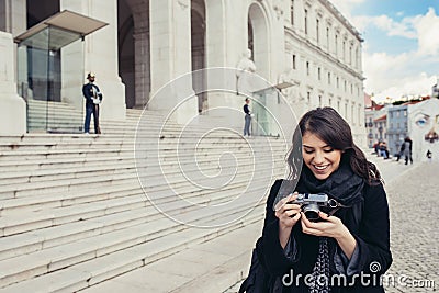 Female tourist standing in front of the Parliament of Portugal, Assembly of the Republic Stock Photo