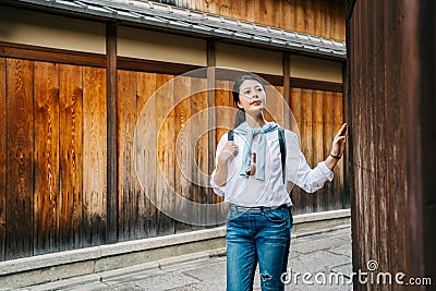 Female tourist walking in the Ishibe alley Stock Photo