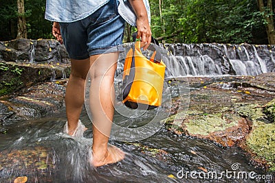 Female tourists at the waterfall Stock Photo