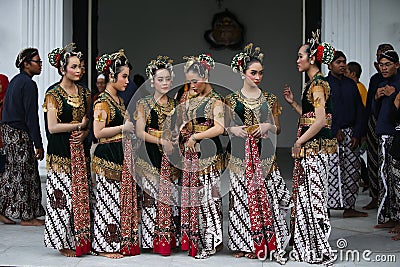 Female traditional dancers, lining up for photo session, after performance in Yogyakarta Sultan's Palace on 17 April 2021 Editorial Stock Photo