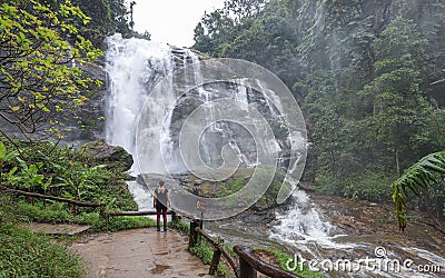 A female traveler at Wachirathan Waterfall Editorial Stock Photo