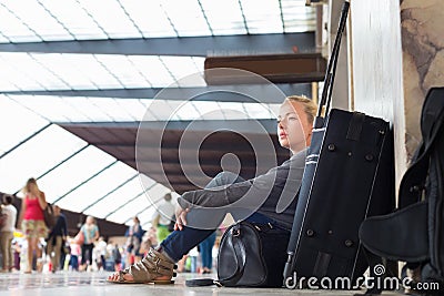 Female traveler waiting for departure. Stock Photo