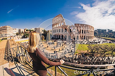 Female traveler watching over the Colosseum in Rome, Italy Editorial Stock Photo