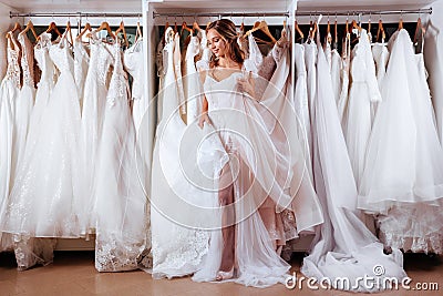 Female trying on wedding dress Stock Photo