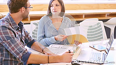 Female tutor prepared for her session with male student Stock Photo