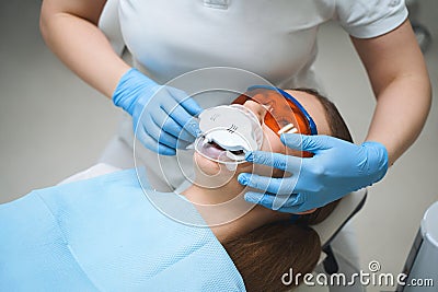 Woman with dental gadget in mouth stock photo Stock Photo