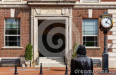 Female walking in Downtown Greenville on Main Street Editorial Stock Photo