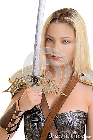 Female warrior holding sword Stock Photo