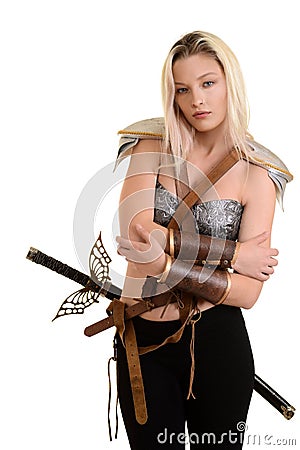 Female warrior hugging herself Stock Photo