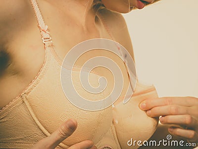 Female wearing too big bra Stock Photo