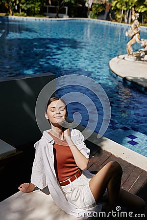 Female woman body vacation summer person blue leisure water lifestyle beauty young pool pretty Stock Photo